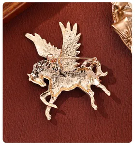Detailed macro view of the back side of a gold Pegasus brooch with pin fastener