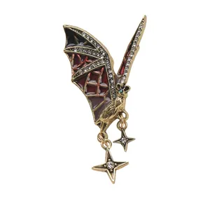 Vintage Gothic style bat brooch with sparkling rhinestones and dark red enamel wings
