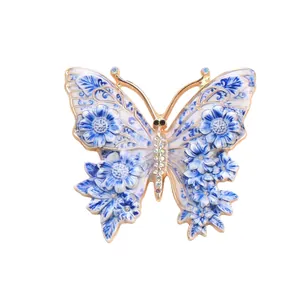 Vintage Schmetterling Brosche mit blauem Emaille-Blumenmuster und Strass