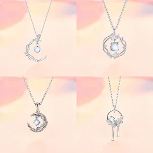 Original design silver necklaces set with moonstone pendants in moon and floral shapes
