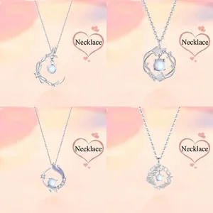 Set of four elegant silver necklaces featuring faux moonstone pendants in unique designs