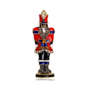 Exquisite nutcracker soldier brooch featuring colorful enamel details and sparkling rhinestones