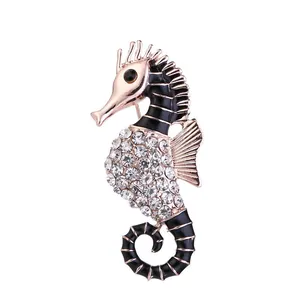 Elegant rose gold seahorse brooch pin with sparkling rhinestones and black enamel detail