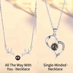 Elegant projection necklaces with reindeer antlers and heart pendants for romantic gifts