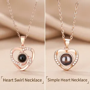 Rose gold heart-shaped projection necklaces with 100 languages I love you stone for her