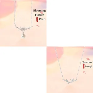 Detailed close-up of elegant silver necklaces with pearl flower and bamboo design pendants
