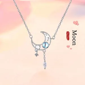 Elegant sterling silver moonstone necklace featuring a dainty moon and star pendant for women