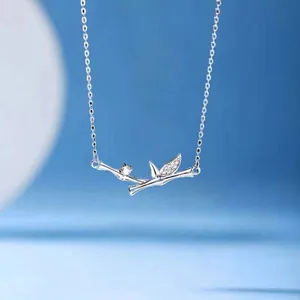 Elegant silver bamboo pendant necklace for women with a sparkling crystal detail