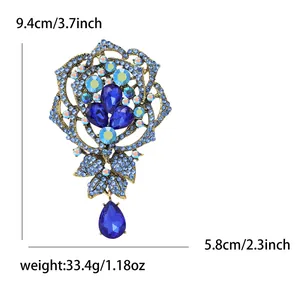 Detail view of luxury blue rhinestone rose brooch with size and weight specs.