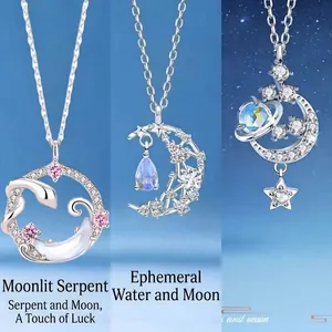 Close-up of silver-plated necklaces with snake, crescent moon, and star pendants