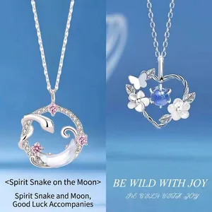 Elegant silver snake moon and floral heart pendant necklaces as premium graduation gifts