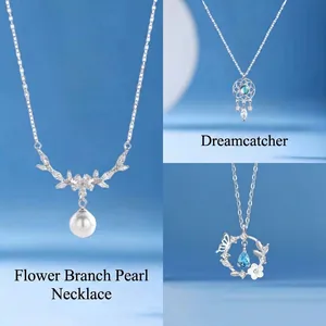 Elegant silver necklace collection featuring pearl branch, dreamcatcher and butterflies.