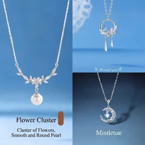 Elegant silver necklace featuring floral and pearl pendant designs with high-quality finish.