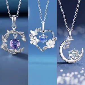 Raffinato set di tre collane fantasia con pendenti a luna cuore e fiocco di neve