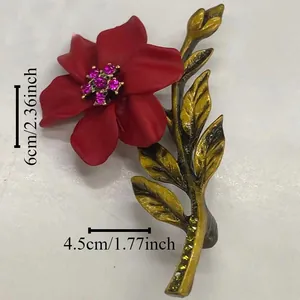 Detailed view of vintage red flower brooch with size measurements of 6cm by 4.5cm