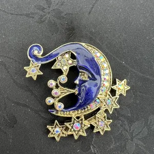 Eleganter Vintage-Brosche aus blauer Emaille mit Mond und Sternen und Strasssteinen
