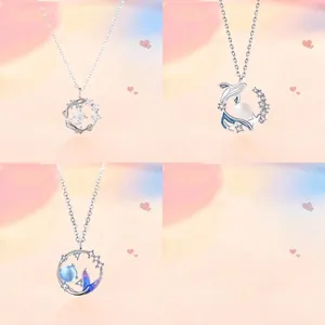 Set of three ocean-themed silver necklaces featuring whale, koi, and mermaid tail pendants
