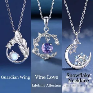 Elegant silver necklaces featuring wing, vine, and snowflake pendants on blue background