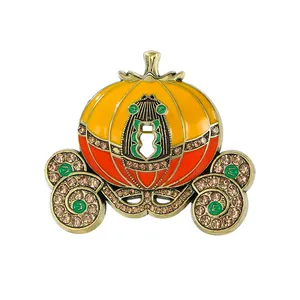 Elegant pumpkin carriage enamel brooch adorned with sparkling crystals for Halloween costumes