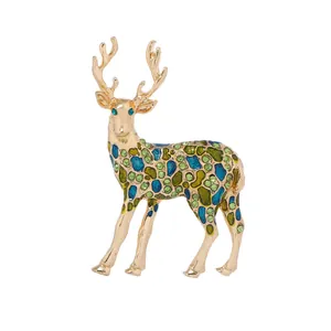 Broche de cerf élégante en métal doré avec émail bleu-vert et strass étincelants