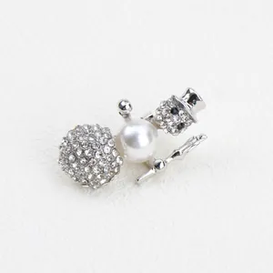 Elegant snowman Christmas brooch with rhinestones and white pearl for holiday parties.