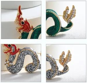 Macro detail shots of vintage Chinese dragon brooch with rhinestones and enamel finish