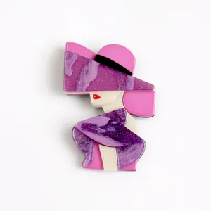 Acrylic modern lady brooch pin featuring an elegant woman in a purple glitter hat.
