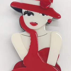 Elegant acrylic brooch featuring a girl in a red hat and dress, stylish handmade acetate pin