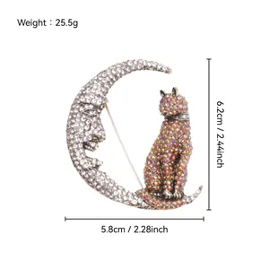Schéma des dimensions de la broche lune et chat en strass avec hauteur de 6,2 cm et poids.