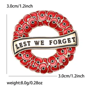 Red enamel poppy wreath brooch with Lest We Forget banner for Remembrance Day, 3cm size