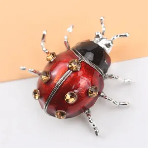 Broche de coccinelle créative avec cristaux étincelants et émail rouge pour vêtements