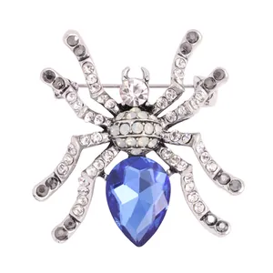 Elegante spin-insectenspeld met groot blauw kristal en strass in zilverlegering