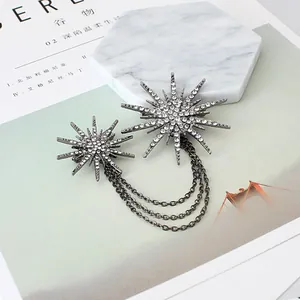 Vintage dark silver star brooch with full rhinestones and triple tassel chains