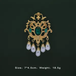 Vintage Baroque gold brooch with green gemstone and teardrop pearls, 7x4.5cm