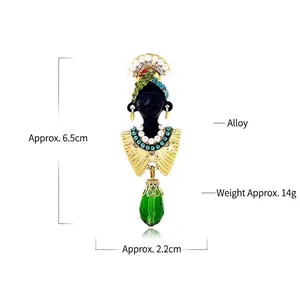 Exotic vintage portrait brooch for women featuring pearls and green crystal pendant