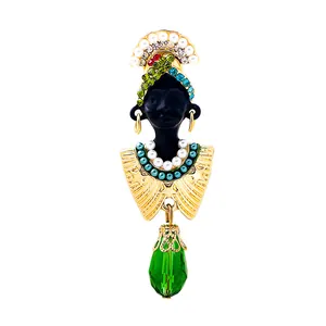 Vintage exotic chieftain's wife brooch with colorful rhinestones and green teardrop