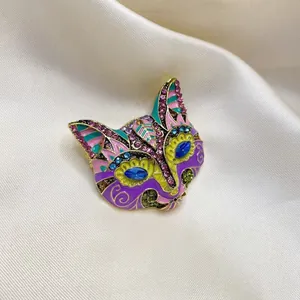 Spilla vintage a maschera di volpe in smalto colorato con strass su raso