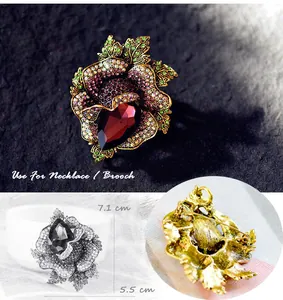 Elegant vintage crystal flower brooch showing 7.1cm dimensions and back clasp view detail.