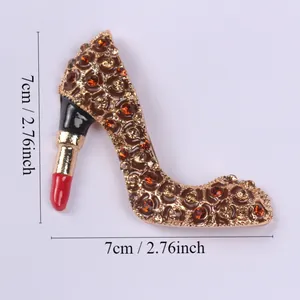 Macro view of crystal flower detailing on lipstick heel brooch with 7cm scale