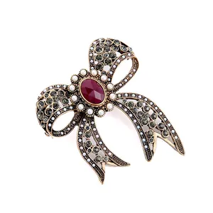 Vintage Hollow Bow Brooch For Women Alloy Antique Gold Rhinestone Artificial Pearl Red Gemstone Brooch Pin Jewelry Accessory