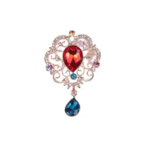 Broche vintage de luxe style cour avec pierre rouge et pendentif en cristal bleu