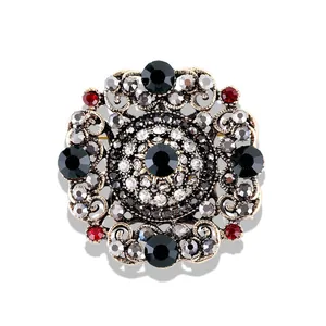 Broche ajourée de style baroque vintage avec cristaux noirs et rouges pour vêtements femme