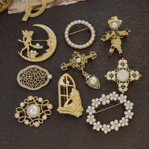 Elegant vintage Baroque style gold pearl brooches collection with intricate palace designs