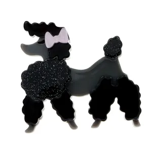 Broche caniche noire en acrylique faite à la main avec paillettes et nœud rose