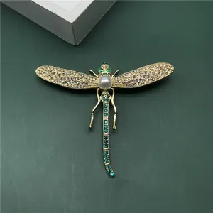 Vintage elegant baroque gold dragonfly brooch pin with white pearl and green crystals