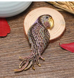 Macro detail view of a vintage parrot brooch set with sparkling colorful rhinestones