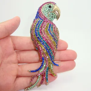 Large vintage style colorful parrot brooch adorned with sparkling multicolored crystals