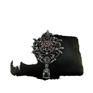 Vintage royal style crown brooch with red and blue rhinestones for elegant suits