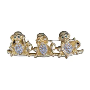 Spilla vintage placcata in oro con tre scimmie e scintillanti strass cechi per abito