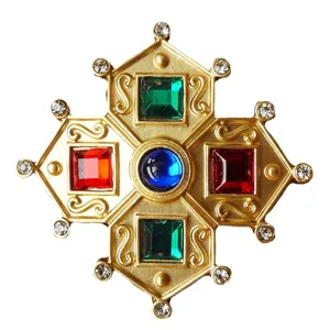 Vintage Baroque style gold cross brooch with colorful gemstones and rhinestones